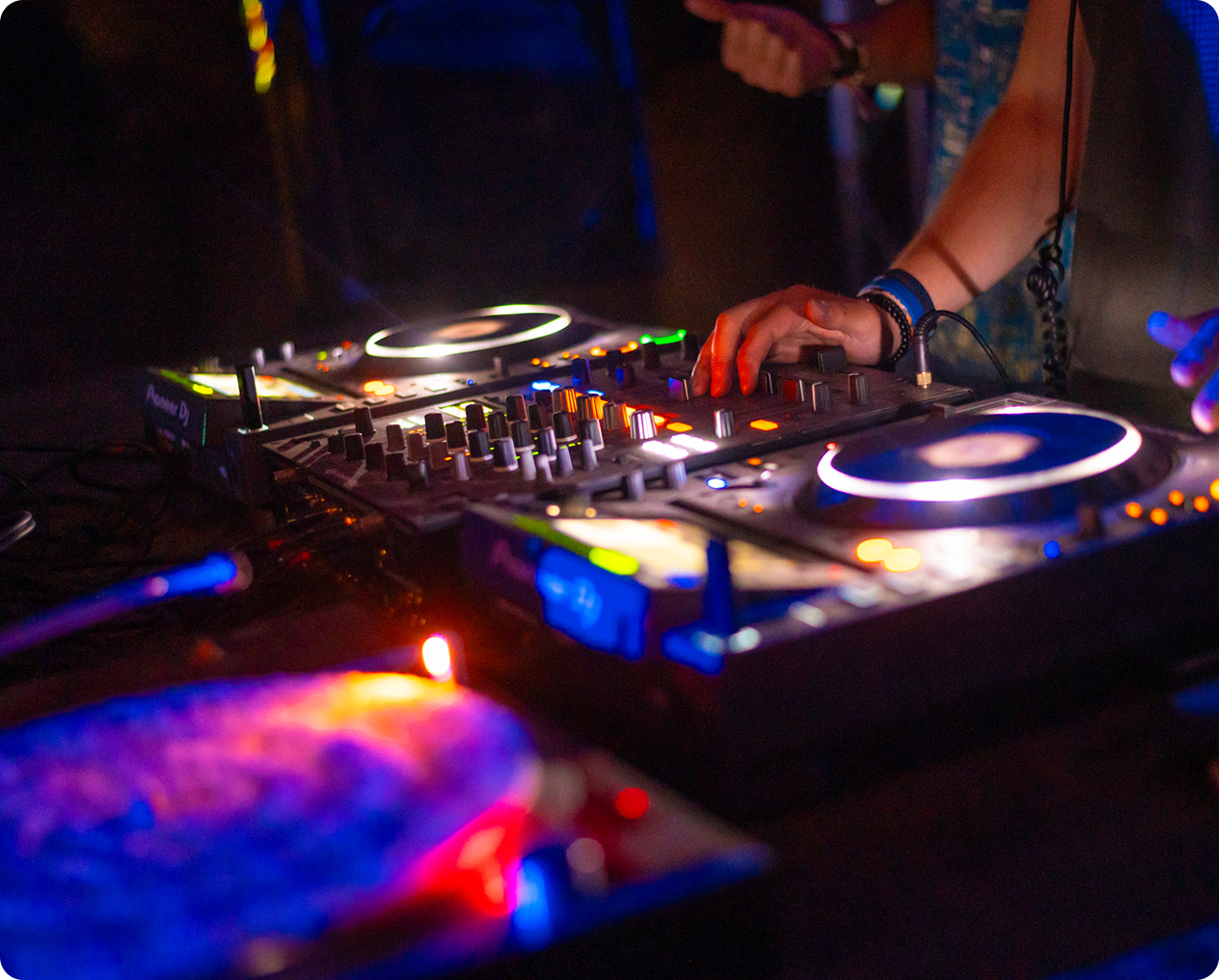 DJ mixing music on turntables